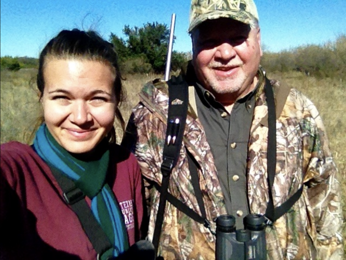 Image of Amanda and her father on a hunting trip.