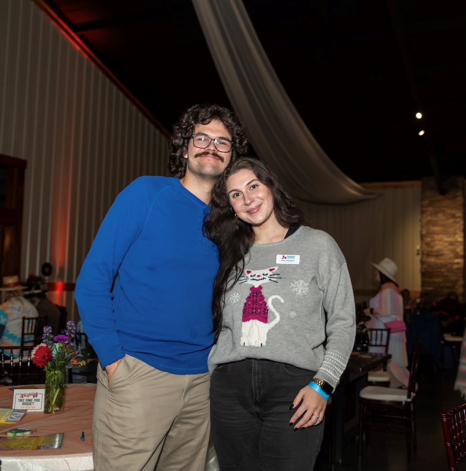 Image of Mary and her fiance Daniel at the Human Society of North Central Florida's annual fundraiser event, Woofstock.