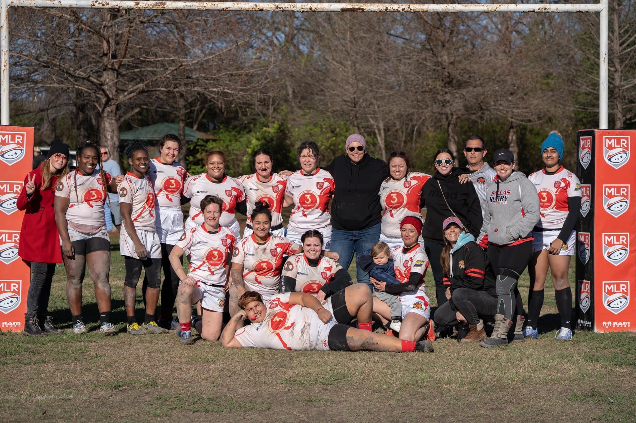 Image of Amanda, fourth from the left, and the Dallas Rugby Football Womxn's team after a match.