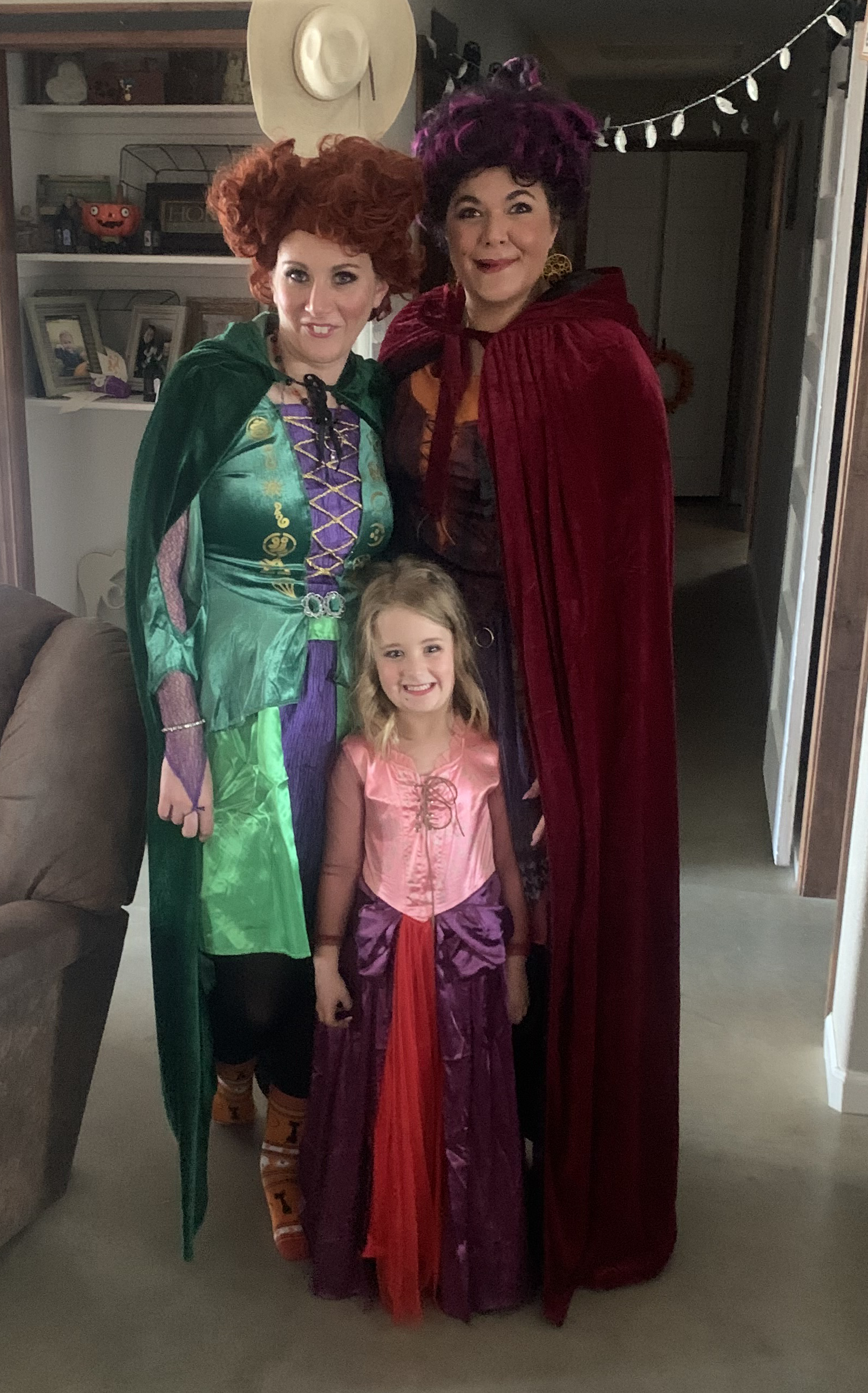 Image of Amanda, her sister and her niece dressed up as the Sanderson sisters from the movie "Hocus Pocus" for Halloween.