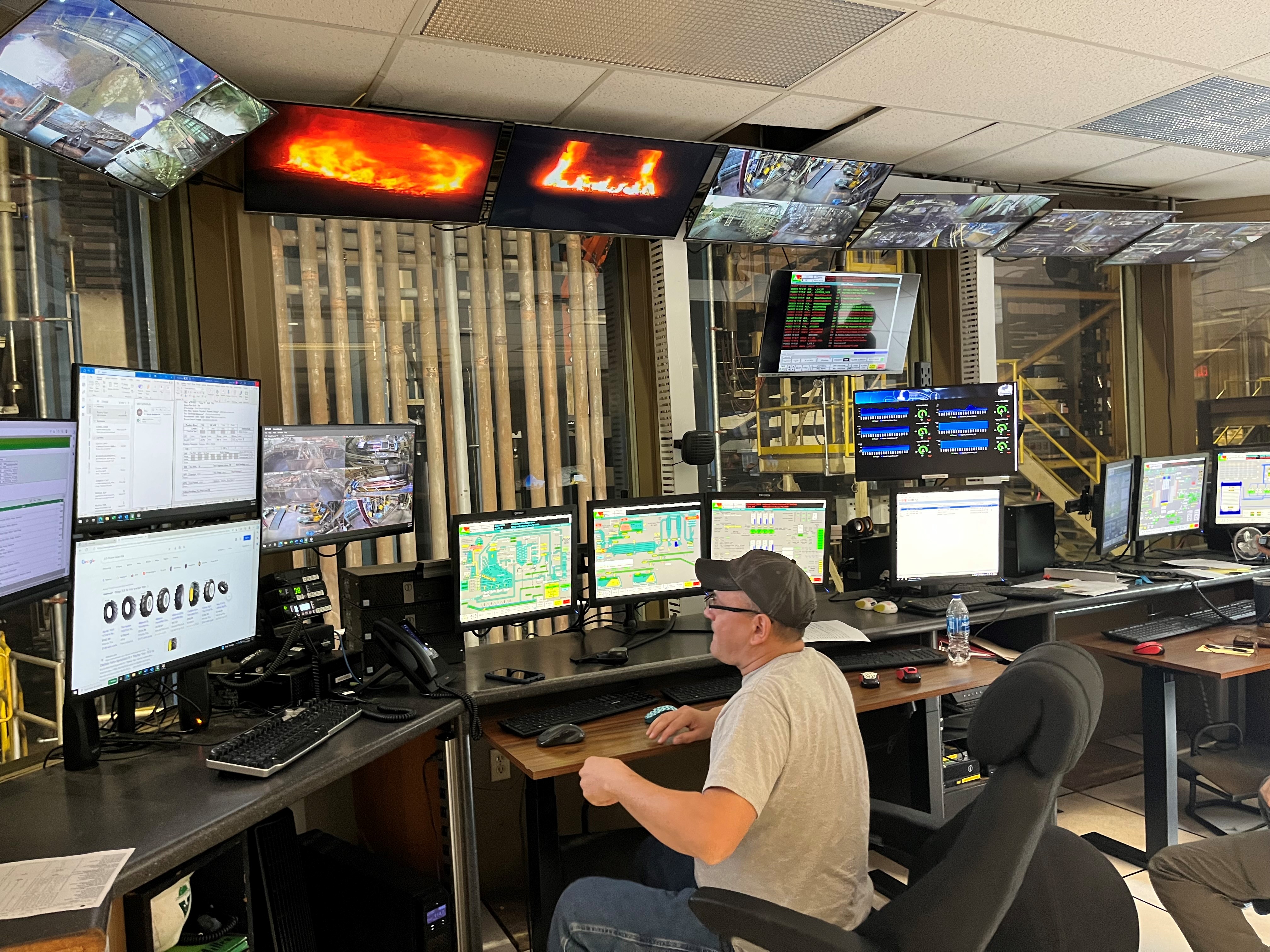 Image of Ted Pendry, operations team member, watching the dryer controls.