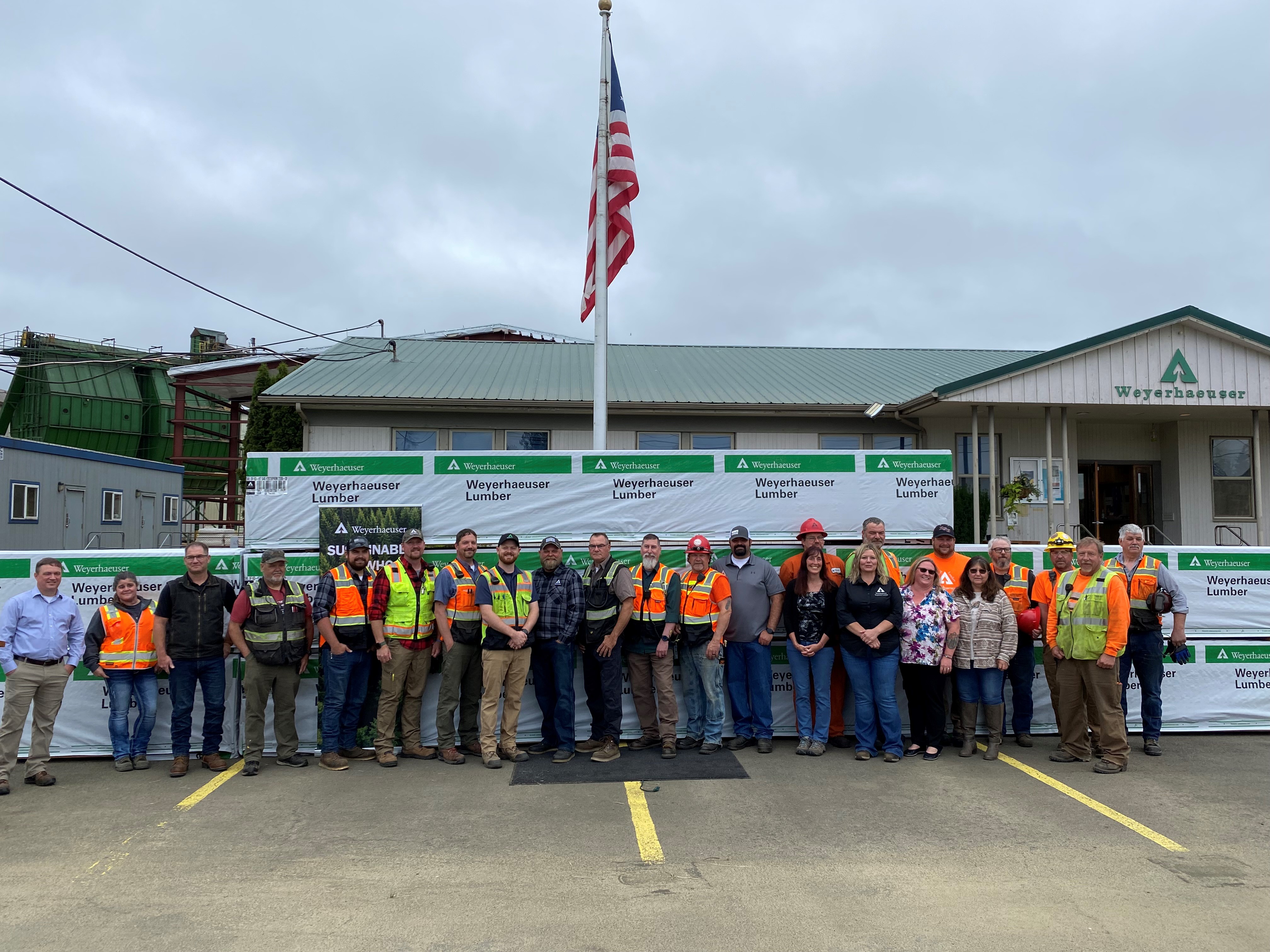 Image of members of the Raymond team gathering for a photo during the July 17 celebration.