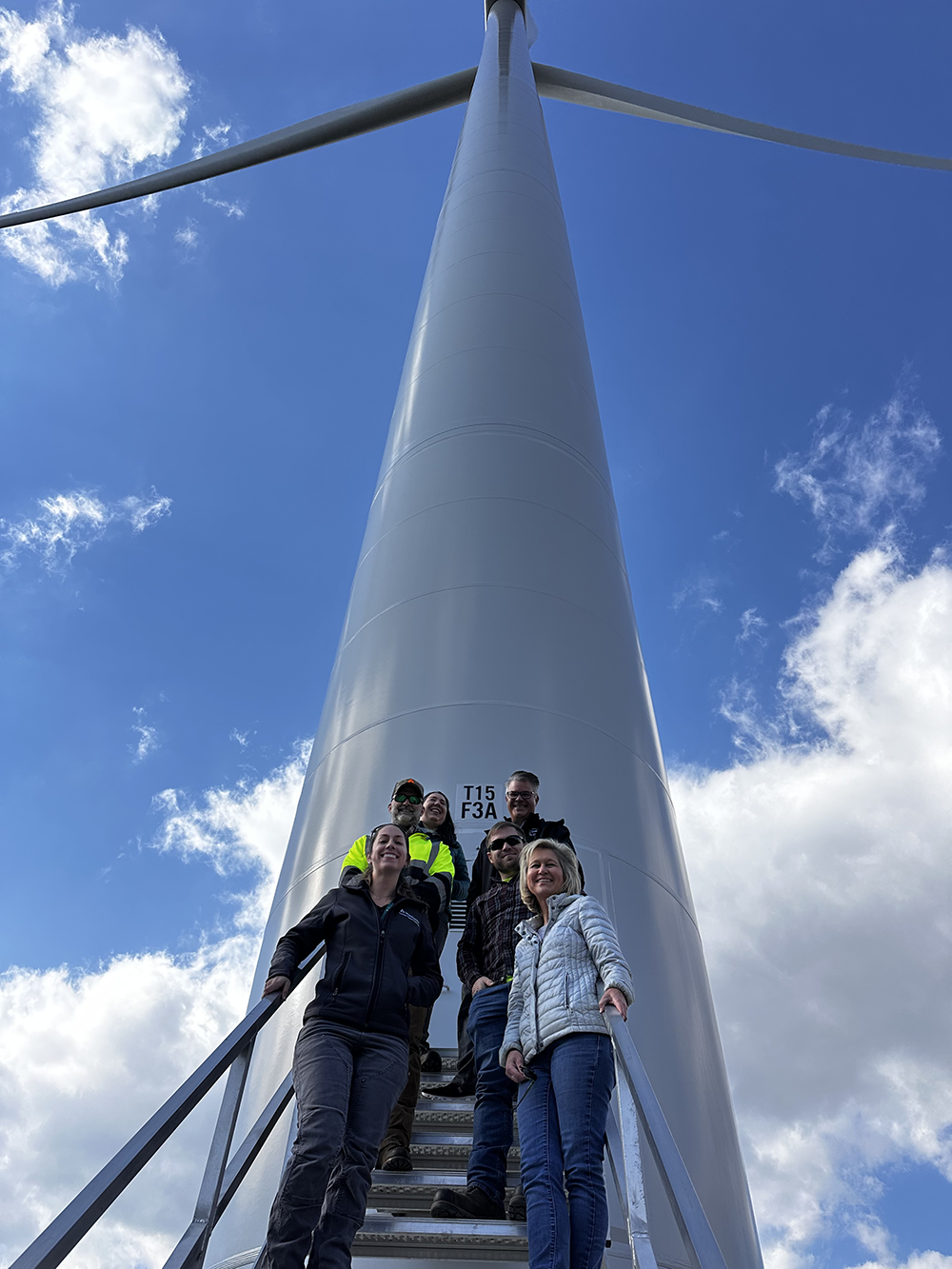 Image of some of our Timberlands and CDO employees gatering on the servie stairs for a turbine during a recent site visit.