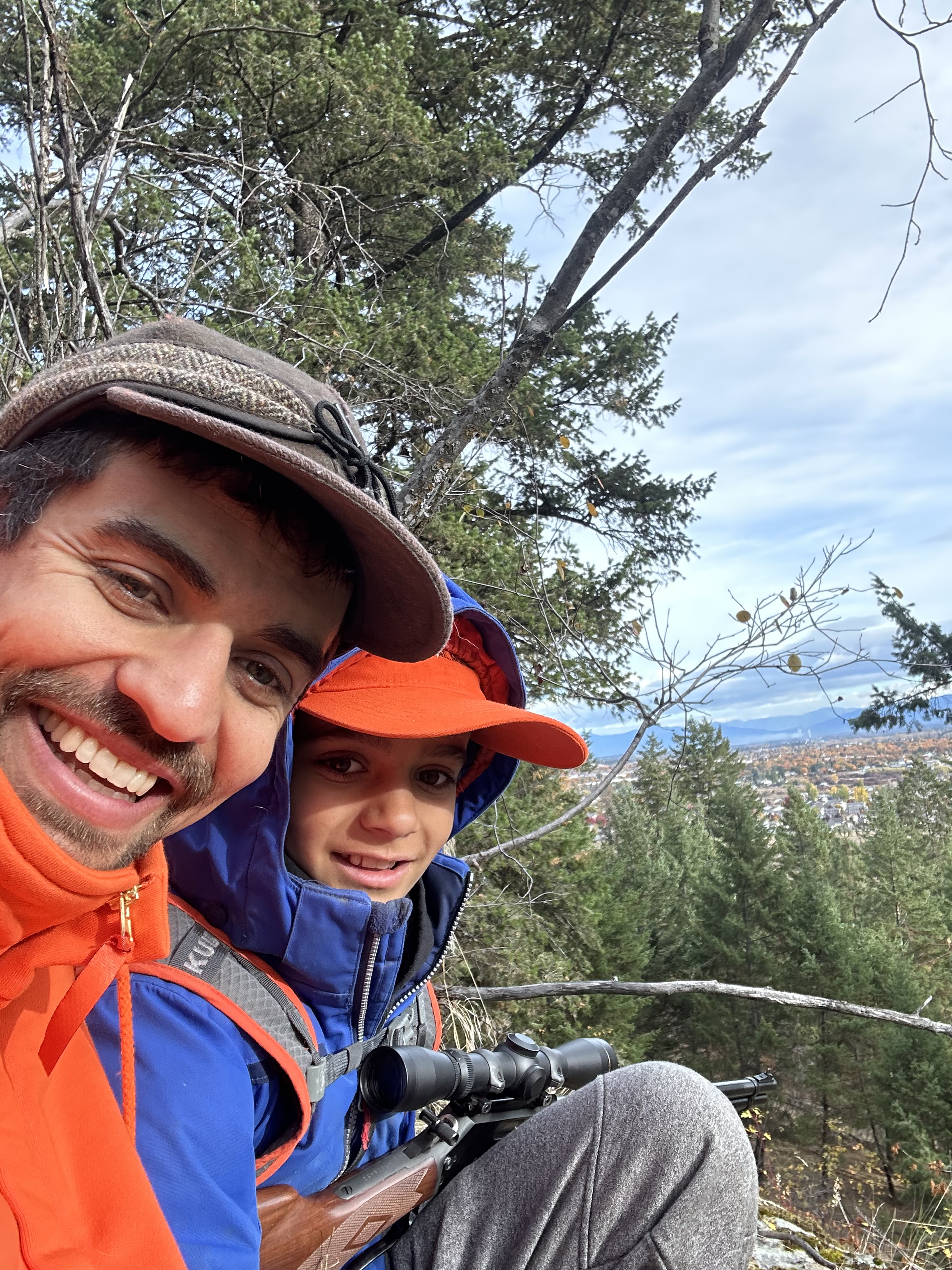 Image of Zack and his son enjoying the outdoors.