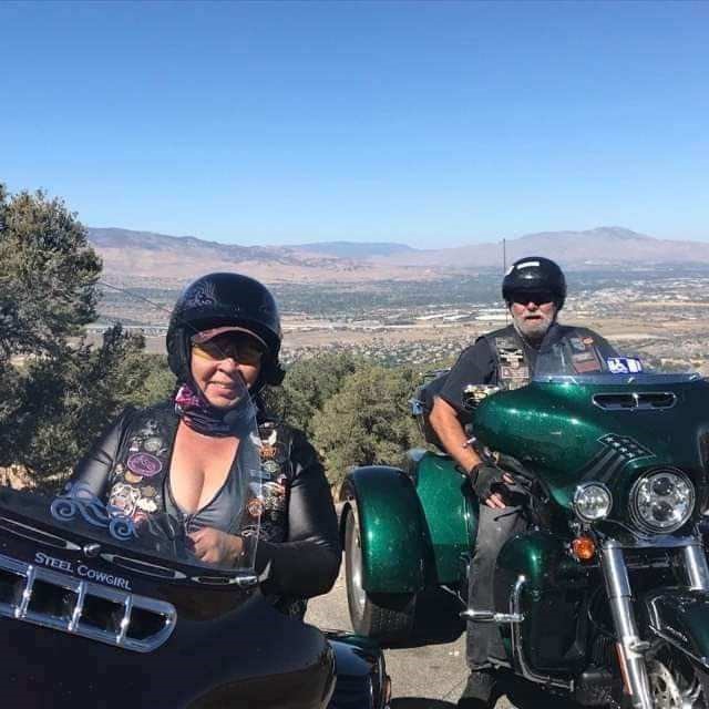 Image of Wanika and her boyfriend Larry riding their motorcycles.